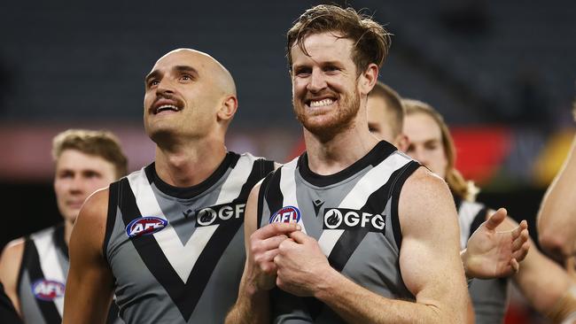 MELBOURNE, AUSTRALIA - AUGUST 14: Tom Jonas of the Power and Sam Powell-Pepper of the Power celebrate winning the round 22 AFL match between the Essendon Bombers and the Port Adelaide Power at Marvel Stadium on August 14, 2022 in Melbourne, Australia. (Photo by Daniel Pockett/Getty Images)