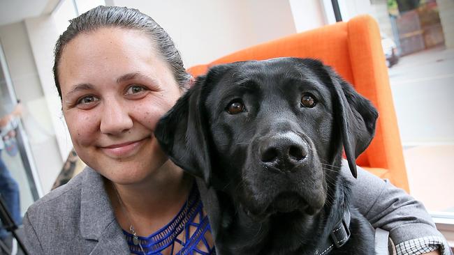 Hobart's Sara Waitzer with her guide dog Pepper before the Guide Dog Graduation Ceremony at Guide Dogs Tasmania. Picture: SAM ROSEWARNE