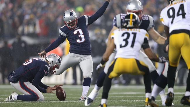 Stephen Gostkowski #3 of the New England Patriots kicks a field goal.