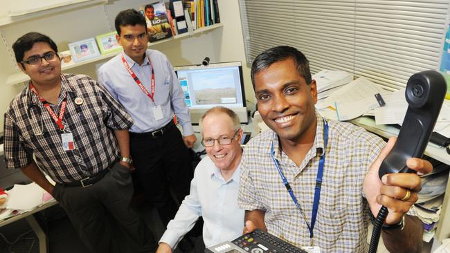 Associate Prof Sabe Sabesan works in telehealth – video conferencing patients that live in rural and remote areas of Queensland. He is in front with behind him, Dr Abhishek Joshi (in dark check shirt L), Dr Zulfy Otty (blue shirt and red lanyard) and Dr Sean Brennan. .