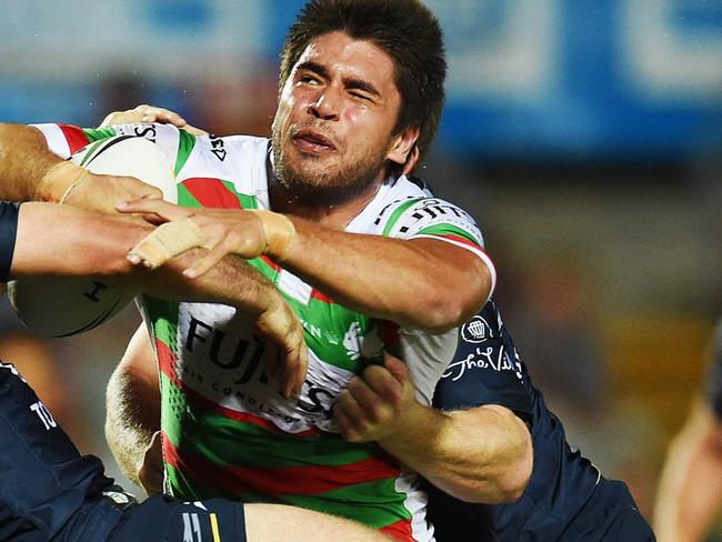 The North Queensland Cowboys v South Sydney Rabbitohs from 1300 Smiles Stadium, Townsville. Rabbitohs Chris Grevsmuhl pumps off Cowboys players Lachlan Coote and Michael Morgan to score a try. Picture: Zak Simmonds