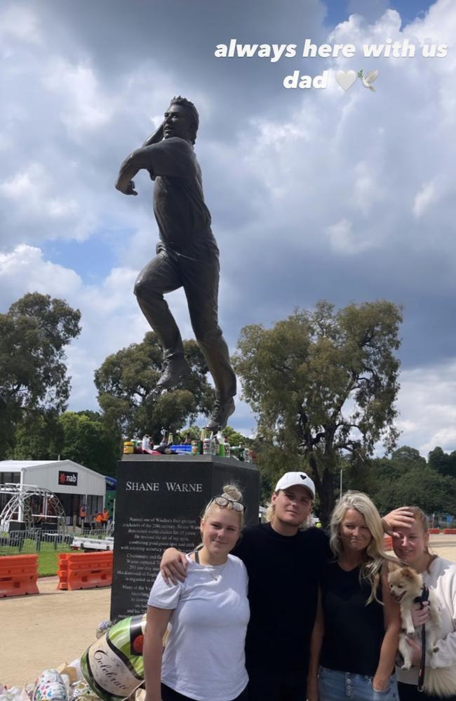 Brooke, Warne , Jackson Warne , Simone Callahan and Summer Warne visit the Shane Warne statue at the MCG in a photo posted on Summer Warne's Instagram.