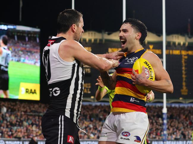 ADELAIDE, AUSTRALIA - AUG 17: Tempers flare between Travis Boak of the Power and Izak Rankine of the Crows during the 2024 AFL Round 23 match between the port Adelaide Power and the Adelaide Crows at Adelaide Oval on August 17, 2024 in Adelaide, Australia. (Photo by Sarah Reed/AFL Photos via Getty Images)