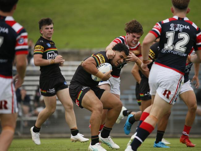 Eddy Cayless makes a tackle. Picture: Warren Gannon Photography.