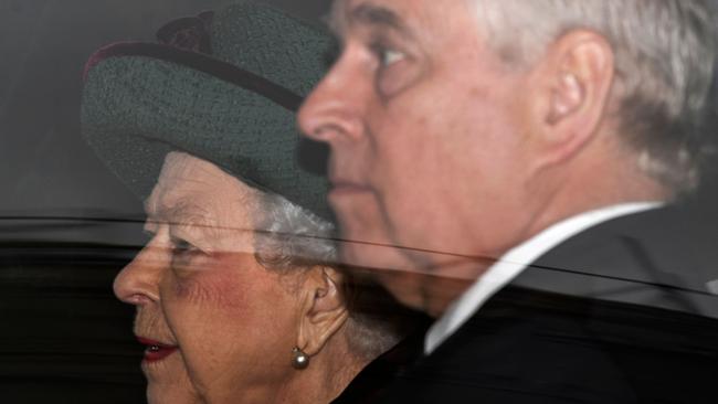 The Queen and Prince Andrew leave by car after attending a Service of Thanksgiving for Britain's Prince Philip. Picture: Justin Tallis/AFP