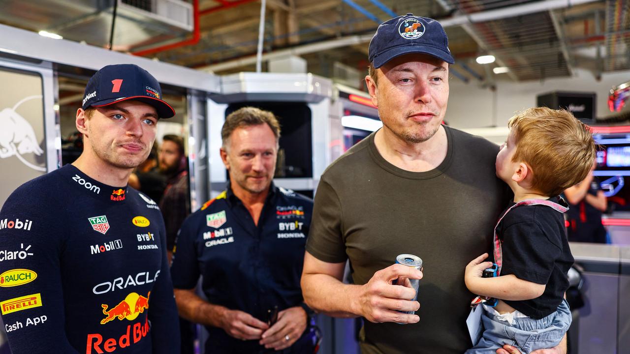 Max Verstappen, Red Bull team principal Christian Horner and Elon Musk talk during final practice ahead of the F1 Grand Prix of Miami. (Photo by Mark Thompson / GETTY IMAGES)