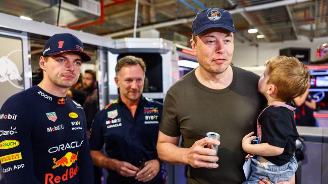 Max Verstappen, Red Bull team principal Christian Horner and Elon Musk talk during final practice ahead of the F1 Grand Prix of Miami. (Photo by Mark Thompson / GETTY IMAGES)