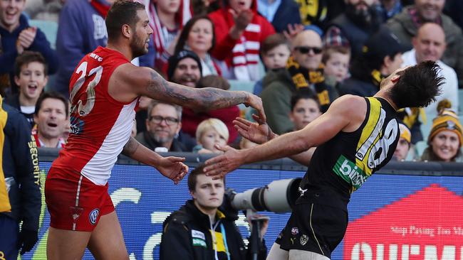 Alex Rance milks a free kick after a push and shove with Lance Franklin. Picture: Michael Klein