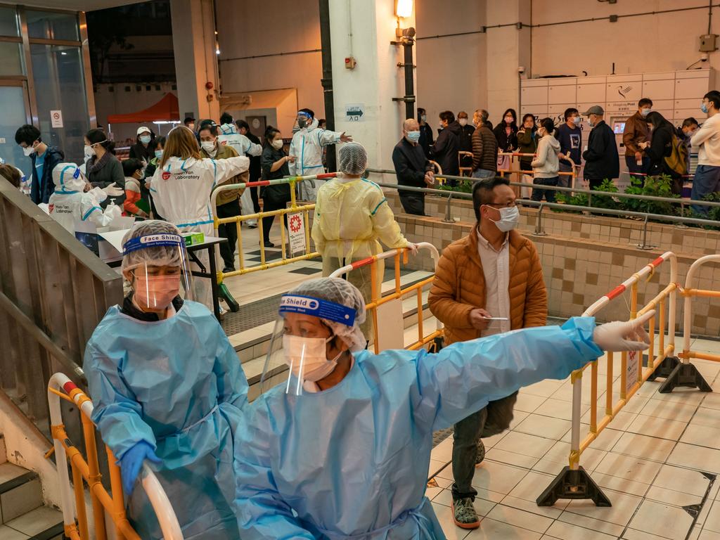 Hong Kong residents get tested for Covid in makeshift stations amid Omicron wave. Picture: Getty Images.