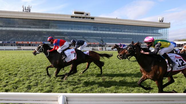 Mark Zahra rides Verry Elleegant (red silks) to victory in the 2020 Caulfield Cup. Picture: George Salpigtidis / Racing Photos