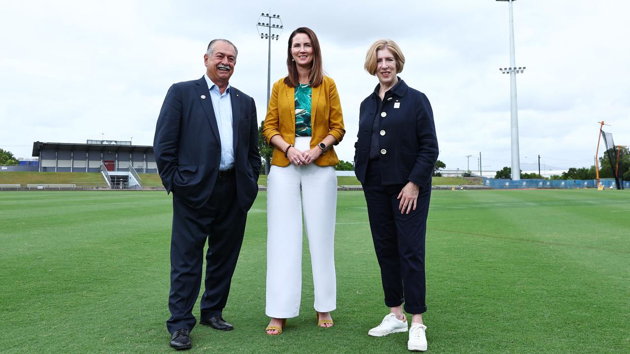 President of the Brisbane Organising Committee for the 2032 Olympic and Paralympic Games Dr Andrew Liveris, Cairns Mayor Amy Eden and Brisbane 2032 Paralympic chairwoman Alison Creagh stand on the field at Barlow Park. Picture: Brendan Radke