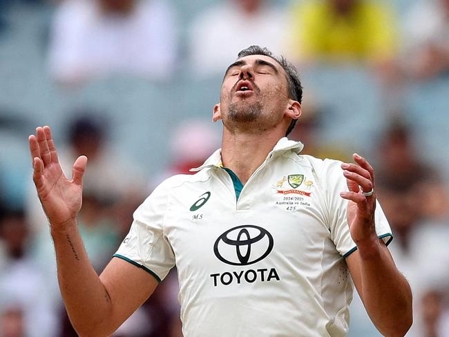 Australia's Mitchell Starc reacts on the third day of the fourth cricket Test match between Australia and India at the Melbourne Cricket Ground (MCG) in Melbourne on December 28, 2024. (Photo by Martin KEEP / AFP) / -- IMAGE RESTRICTED TO EDITORIAL USE - STRICTLY NO COMMERCIAL USE --