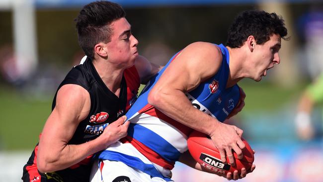 Rising star ... West Adelaide’s Jack Agostino tackles Central District’s Thomas Stevens. Picture: Tom Huntley