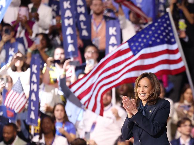 (FILES) US Vice President and 2024 Democratic presidential candidate Kamala Harris waves as she leaves the stage on the fourth and last day of the Democratic National Convention (DNC) at the United Center in Chicago, Illinois, on August 22, 2024. Kamala Harris and Donald Trump are entering the final one-month sprint to the most dramatic US presidential election in modern history, with both candidates warning the fate of a divided nation hangs on a result that is still too close to call. (Photo by CHARLY TRIBALLEAU / AFP)