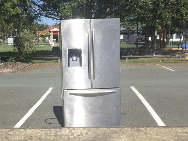 A fridge dumped in the carpark of the Helensvale Hornets rugby league club.