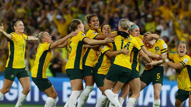 Matildas players celebrate winning the FIFA Womens World Cup match against France.