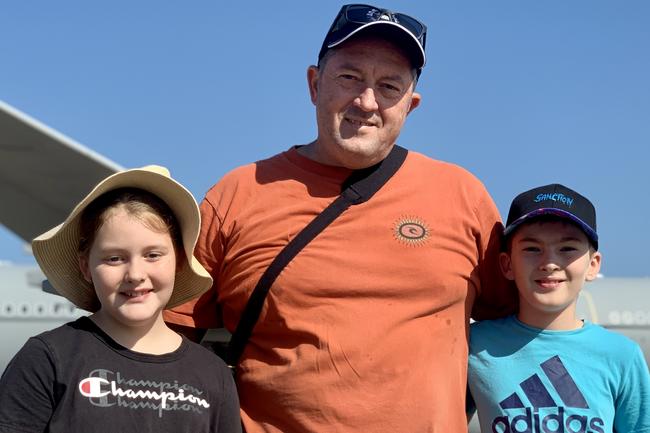 Dad James Harding with kids Eva Harding and Max Harding at the Pitch Black Open Day at RAAF Darwin. Saturday, August 27, 2022. Picture: Tara Miko