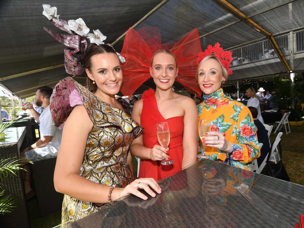 Hannah West, Madeline Cuirn and Niomi Louden enjoy the 2019 Darwin Cup. Picture: KATRINA BRIDGEFORD