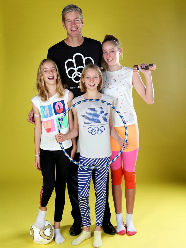 Seems the advertising genes run in the family. James Tomkins with his three girls Georgia, Holly and Jess were part of a Cotton On Kids campaign. Picture Rebecca Michael.