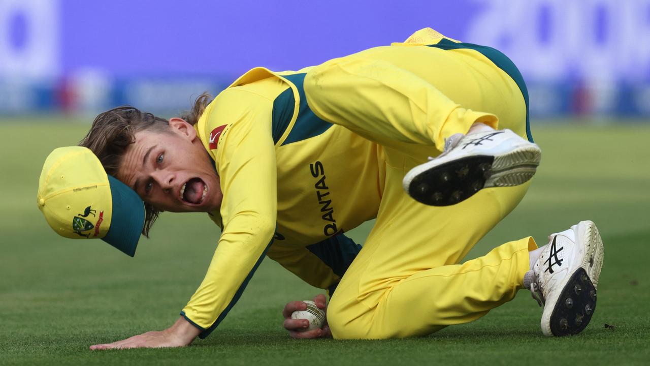 Australian sub fielder Cooper Connolly took two catches. (Photo by Darren Staples / AFP)