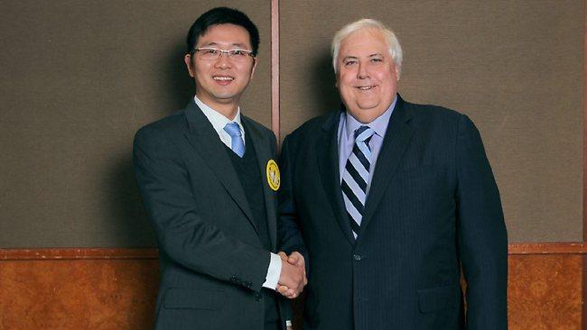 Successful Palmer United Party Senate candidate Zhenya Wang with Clive Palmer.