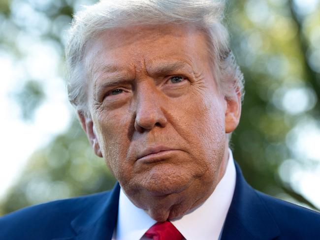 (FILES) In this file photo former US President Donald Trump speaks to the media prior to departing from the South Lawn of the White House in Washington, DC, September 21, 2020, as he travels to Ohio. - Donald Trump on May 5, 2021 reiterated his false claims that voter fraud caused his election loss to Joe Biden last November, shortly after a Facebook oversight board upheld the platform's ban on the former US president. "Had gutless and clueless MINORITY Leader Mitch McConnell... fought to expose all of the corruption that was presented at the time, with more found since, we would have had a far different Presidential result," Trump said in a statement following the Facebook ruling.Trump, who is mulling another run for the White House, repeated his insistence that there is abundant evidence of voter fraud, and urged his followers to "never give up." (Photo by SAUL LOEB / AFP)