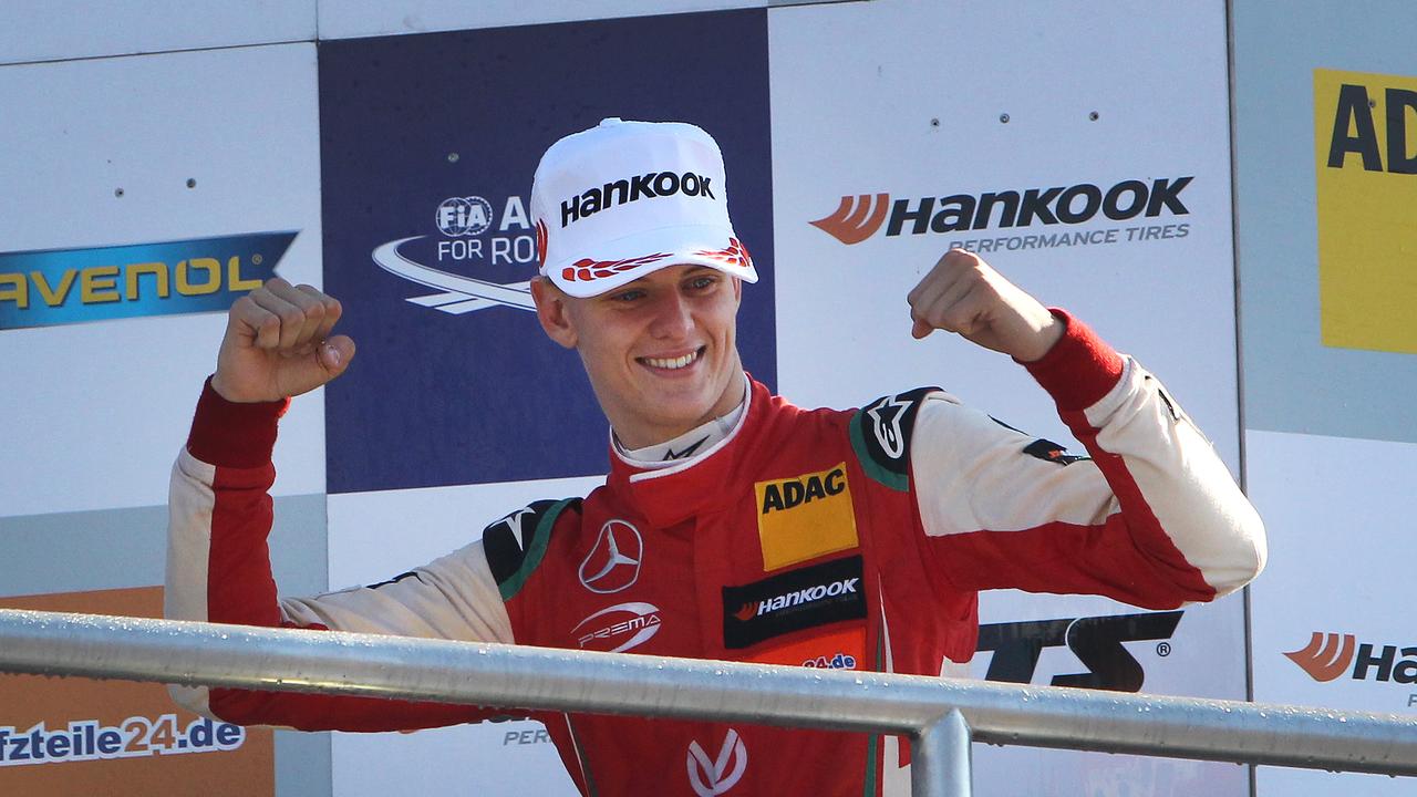 Mick Schumacher junior celebrates after winning the FIA Formula Three European Championship.