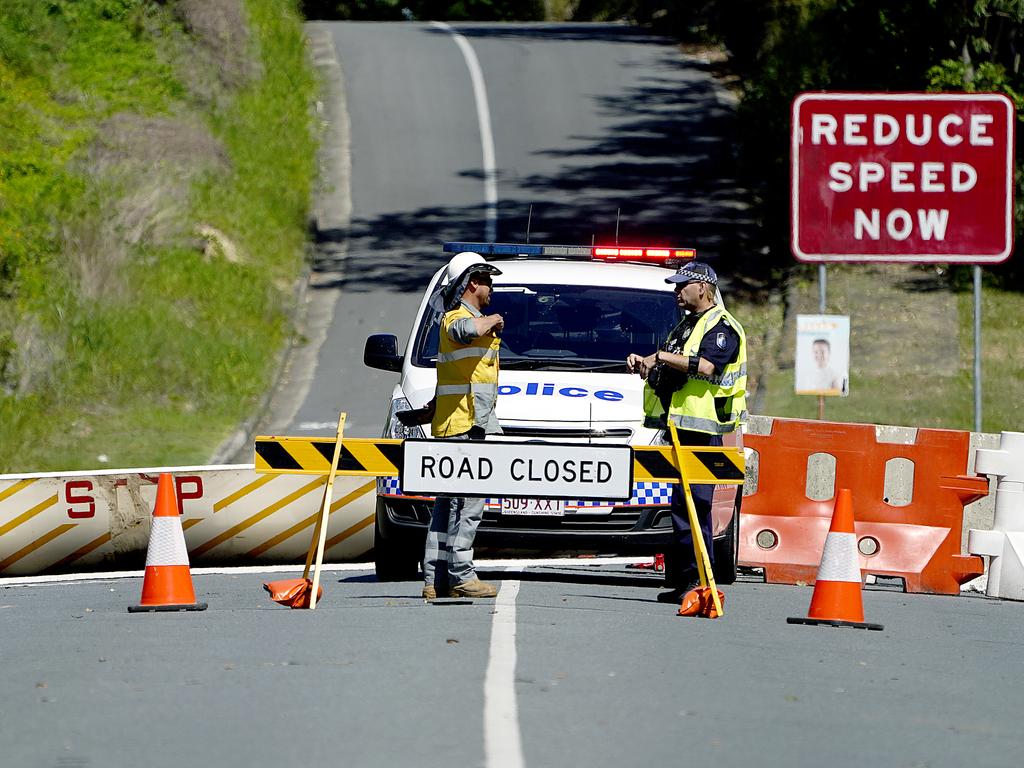 Police at a border closure in Queensland.