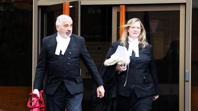 Counsel for Margaret Otto Greg Melick, SC, and Caroline Graves leave the Supreme Court in Hobart after the jury verdict.