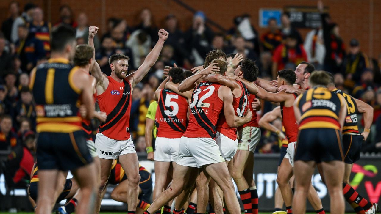 Essendon players celebrate at the final siren. Picture: Mark Brake/Getty Images