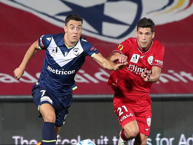 ADELAIDE, AUSTRALIA - APRIL 02:  Christopher James Ikonomidis of the Victory and  Javi Lopez of United  during the A-League Mens match between Adelaide United and Melbourne Victory at Coopers Stadium, on April 02, 2022, in Adelaide, Australia. (Photo by Sarah Reed/Getty Images)