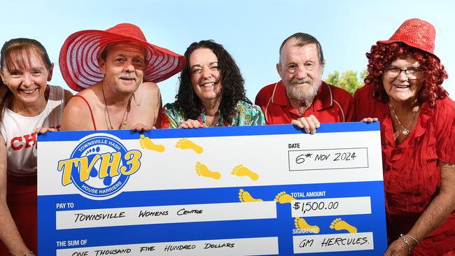 Women's Centre specialist homelessness service team leader Sallie Kearnan (middle), accepts a donation of $1500 from Townsville Hash House Harriers, Evelyn Stent, Bill Stent, Don Brown and Kay Edwards. Picture: Shae Beplate.