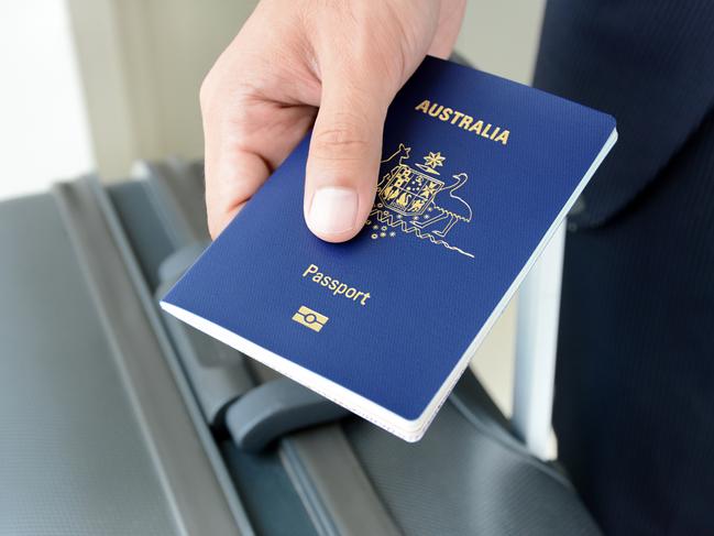 Hands giving passport (of Australia)