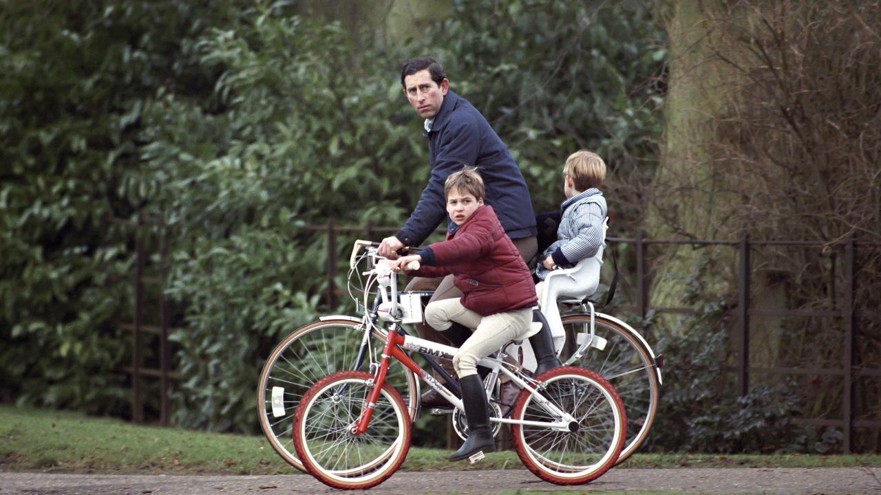 Prince Charles riding bikes with his sons in 1990. Picture: Julian Parker/UK Press via Getty Images