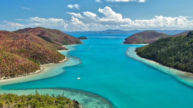 Aerial views of reef inlet in the Marine Park Nara Inlet Whitsundays Photo - Tourism Queensland ESCAPE 20 March 2022 Kendall