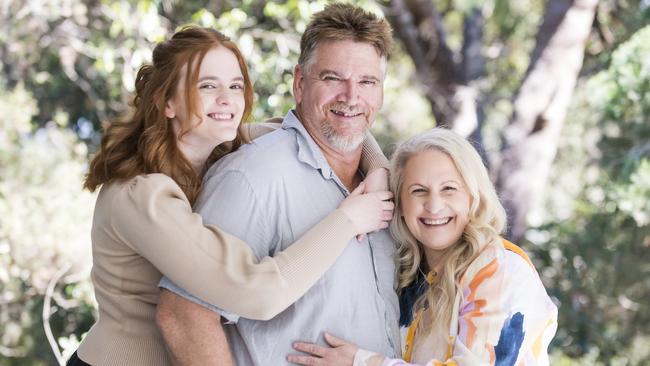 Trudy Vains, right, with husband Craig and daughter Emily