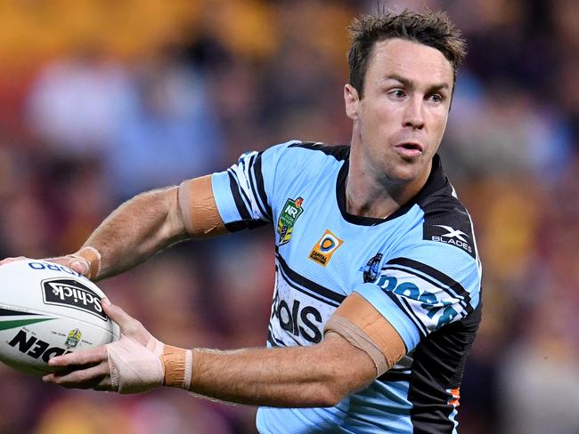 James Maloney (right) of the Sharks in action during the round 23 NRL match between the Brisbane Broncos and the Cronulla Sharks played at Suncorp Stadium in Brisbane, Friday, August 11, 2017. (AAP Image/Darren England) NO ARCHIVING, EDITORIAL USE ONLY