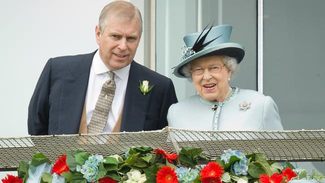 Prince Andrew, the Duke of York (L) speaks to Queen Elizabeth II.