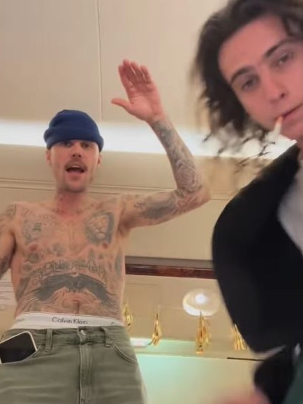 A shirtless Justin Bieber raps about being “high” in new video with a friend.