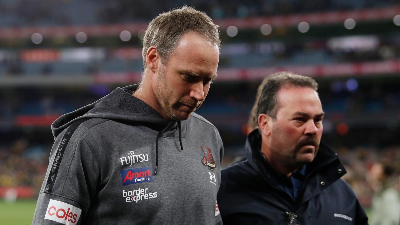 Essendon coach Ben Rutten walks off the MCG after Saturday night’s loss. Picture: Dylan Burns/AFL Photos