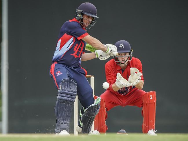 Premier Cricket: Melbourne v Dandenong. Dandenong batsman Tom Donnell and Melbourne keeper Sebastian Gotch. Picture: Valeriu Campan