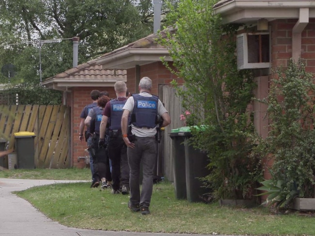 Police raid a home in Melbourne's south on Tuesday. Picture: Victoria Police