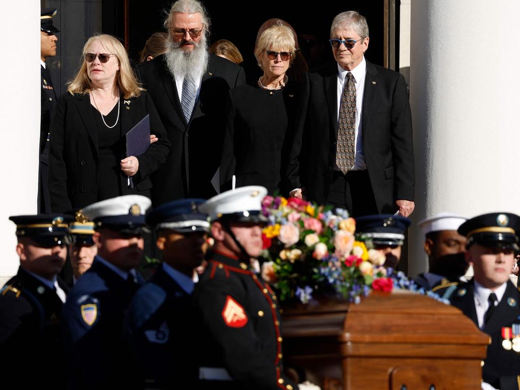 Members of former first lady Rosalynn Carter’s family look on as her casket is carried out of Glenn Memorial United Methodist Church following her tribute service. Picture: Getty Images/AFP