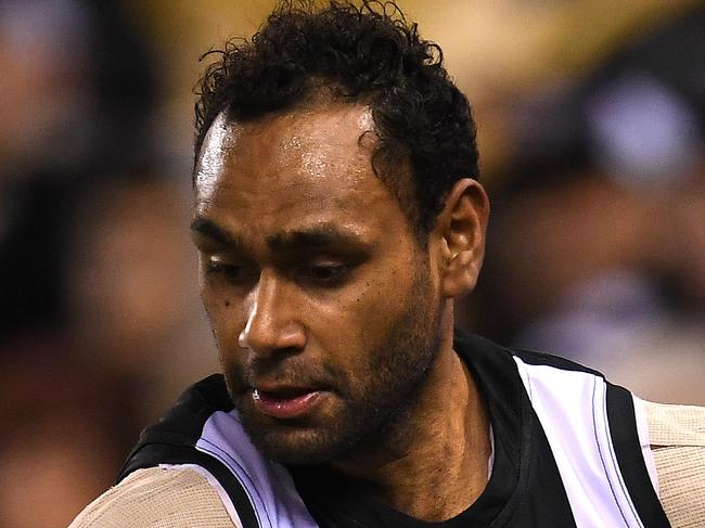 Travis Varcoe of the Magpies is seen in action during the Round 21 AFL match between the Collingwood Magpies and the Brisbane Lions at Etihad Stadium in Melbourne, Saturday, August 11, 2018. (AAP Image/Julian Smith) NO ARCHIVING, EDITORIAL USE ONLY