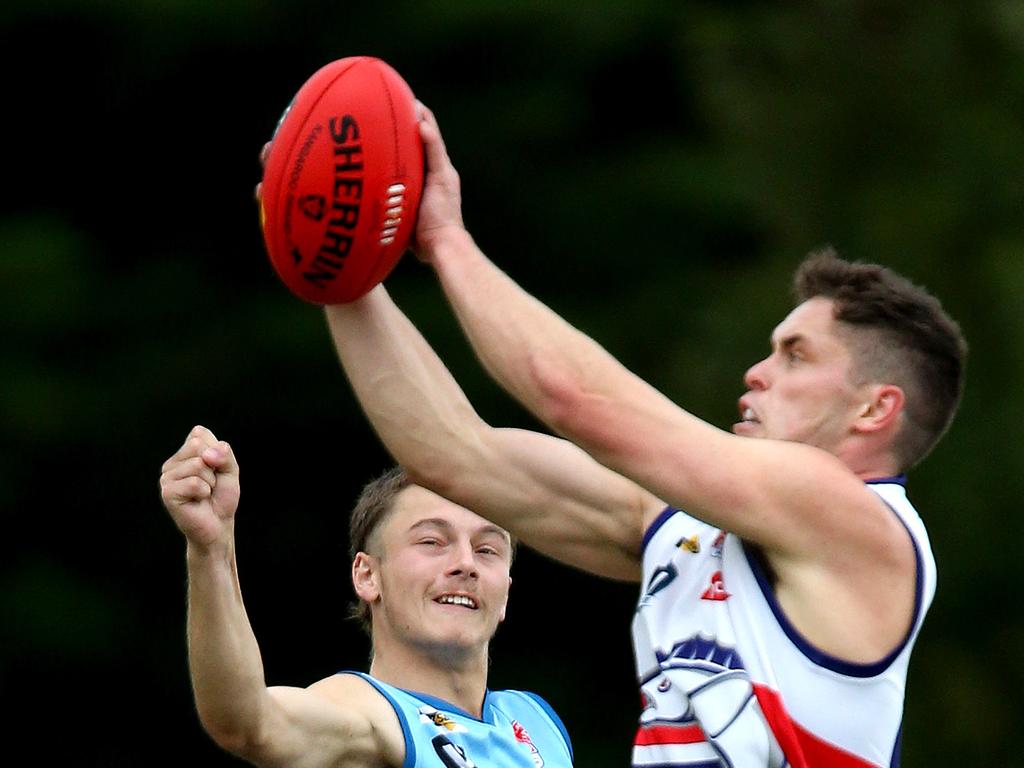 Football BFL: Modewarre v Queenscliff. Queenscliff 23 Nick Maishman marks over Modewarre 40 Declan Prigg Picture: Mark Wilson