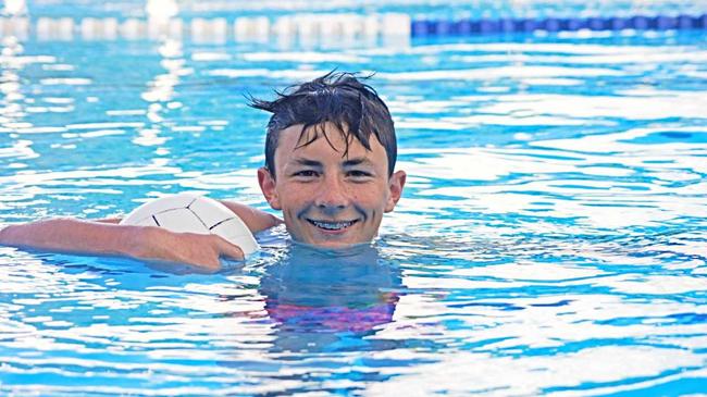 TAKING ON THE BEST: Ben Armbruster hit the pools at the Brisbane Aquatic Centre where he took on an Olympic legend. Picture: File