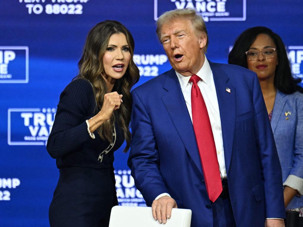 Donald Trump on stage with South Dakota Governor Kristi Noem. Picture: AFP