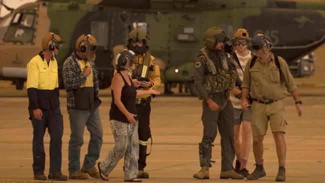 Safe... The Tytherleigh family in Nowra after the airlift. Picture: ADF