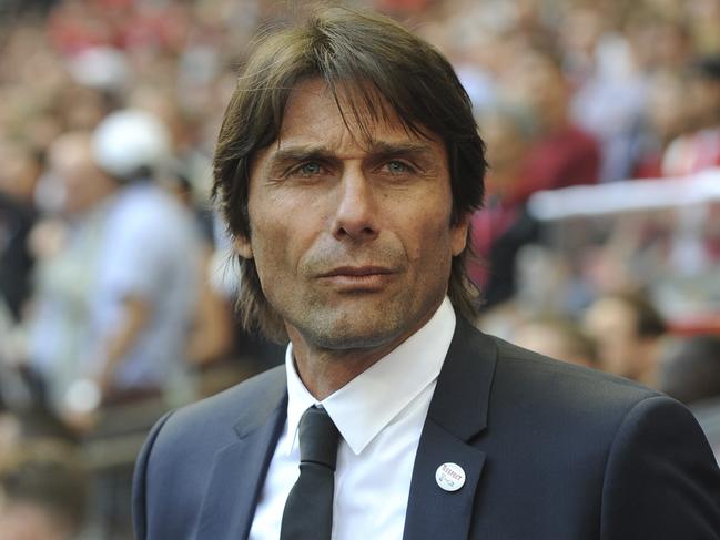 FILE - In this Saturday, May 19, 2018 file photo, Chelsea manager Antonio Conte looks on during their English FA Cup final soccer match against Manchester United at Wembley stadium in London, England. Chelsea has fired manager Antonio Conte after a two-year tenure in which he won the English Premier League and FA Cup. The London club said on Friday, July 13, "We wish Antonio every success in his future career." (AP Photo/Rui Vieira, file)