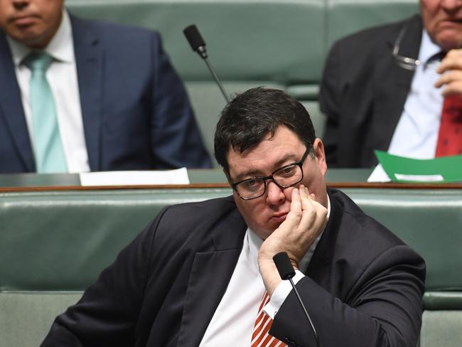 Nationals Member for Dawson George Christensen listening to Australian Prime Minister Malcolm Turnbull in the House of Representatives at Parliament House in Canberra. Picture: AAP